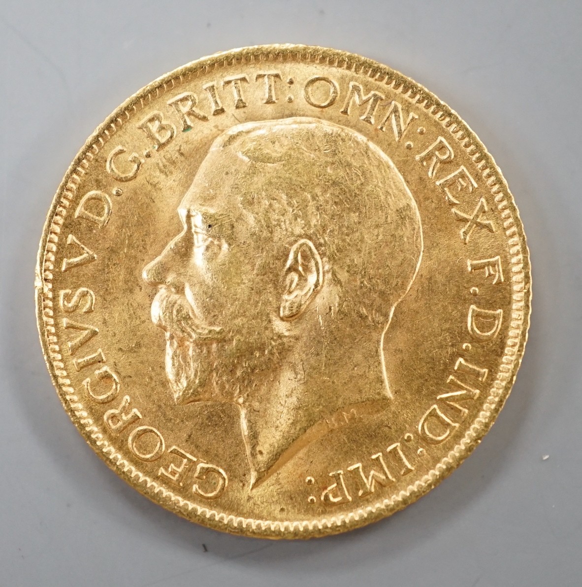 A George V 1912 gold sovereign.